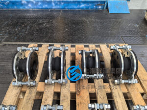 High-pressure rubber expansion joint used in industrial piping systems to absorb vibration and thermal expansion