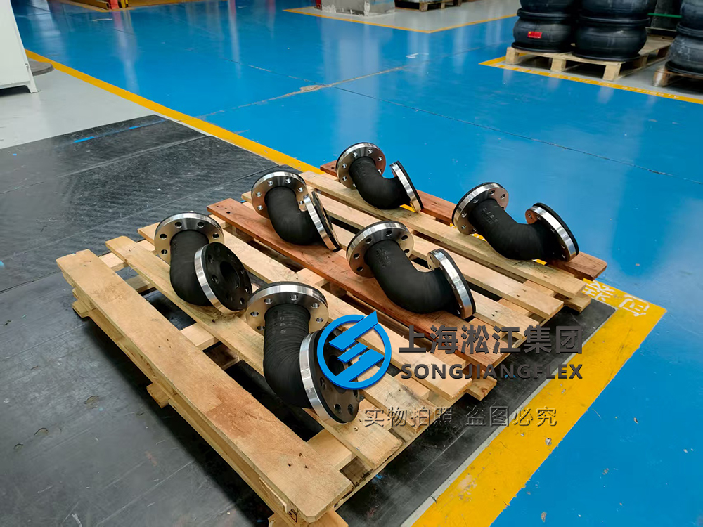 Custom wrapped rubber elbow expansion joint for marine lube oil transfer systems